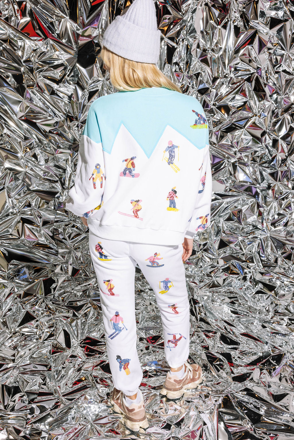 White Skiers On Mountain Joggers